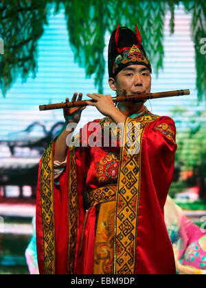 Musician playing flute during a traditional Tang dynasty Chinese opera Stock Photo