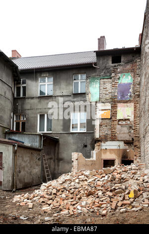 Abandoned, decayed and partly demolished building in Bialogard, Poland. Stock Photo