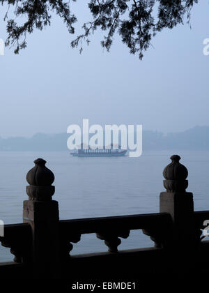 China Beijing Summer Palace misty lake and tree view Stock Photo - Alamy
