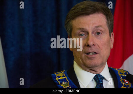 Toronto, Canada. 2nd December, 2014. Mayor John Tory is seen standing alongside former Ontario premier Bill Davis, speaking with reporters after the mayor's inaugural council meeting. Credit:  Nisarg Lakhmani/Alamy Live News Stock Photo