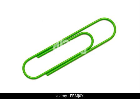 Giant paper clips arranged on a white paper background Stock Photo