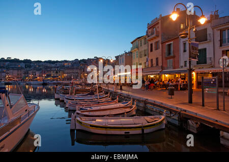 Harbour and historic town centre, small fishing boats, street cafes and restaurants, evening mood, Cassis, Département Stock Photo