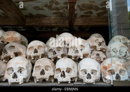 Skulls and bones in the Memorial Stupa to the prisoners murdered by the Communist or Maoist Khmer Rouge in Choeung Ek Stock Photo
