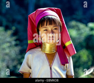 Girl of the Padaung mountain tribe, also known as giraffe women, wearing neck rings, Chiang Rai Province, Northern Thailand Stock Photo