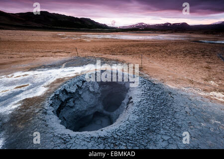 Solfataras, fumaroles, mud pots, mud pools, sulfur and other minerals, evening mood, high temperature or geothermal area of Stock Photo