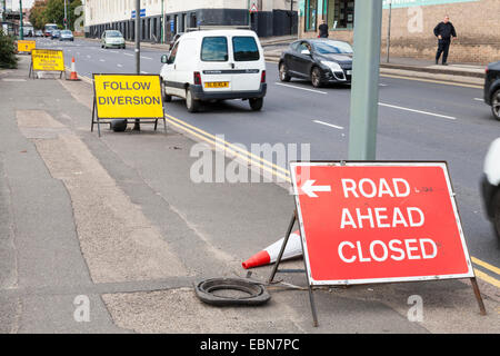 Road ahead closed sign and other signs, Nottingham, England, UK Stock Photo