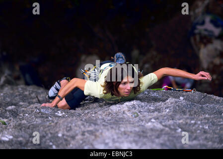 Girl climbing over Moutiers village in Savoy, France, Savoie Stock Photo