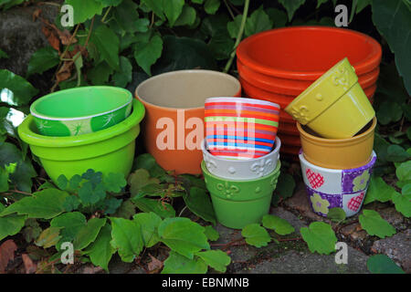 colourful flowerpots in the garden Stock Photo