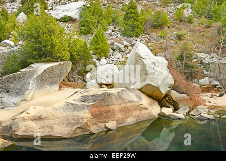 rocks at lake shore, USA, California, Yosemite National Park Stock Photo