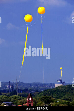 big yellow ballons over European Capital of Culture Essen marking former sites of coal mines, 'Schachtzeichen' , Germany, North Rhine-Westphalia, Ruhr Area, Essen Stock Photo