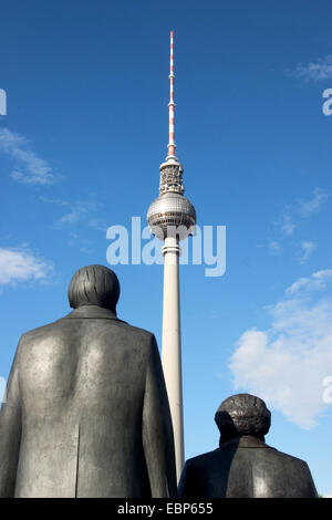 statues of Marx and Engels; television tower, Germany, Berlin Stock Photo