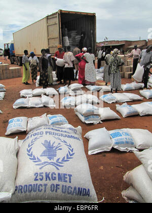 refugee camp for internally displaced people in northern Uganda around Gulu, the non-governmental organisation 'Norwegian Refugee Council' is distributing food rations for the UN World Food Programme for elderly and hancicapped people, bags with mais lyin, Uganda, Gulu, Gulu Stock Photo