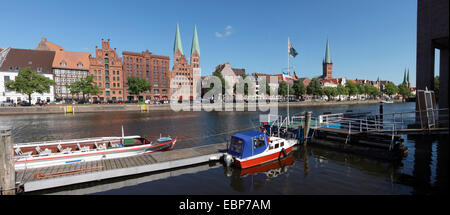 warehouses at River Trave and St. Mary's Church, view to town, Germany, Schleswig-Holstein, Luebeck Stock Photo