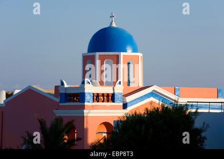 Ia, Santorini, South Aegean, Greece. Colourful blue-domed church. Stock Photo