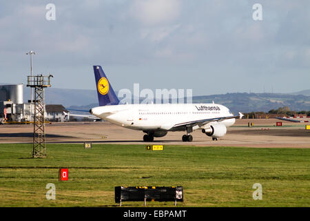 Lufthansa Airbus A320, taxiing at Manchester International Airport. Stock Photo