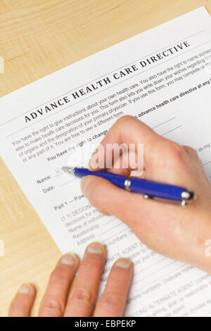 Signing an Advance Health Care Directive (vertical) Stock Photo