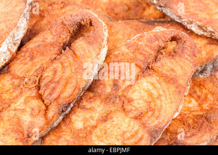 Delicious seer/mackerel fish fillets fry. The fish is marinated in cayenne pepper, salt and deep fried. Stock Photo