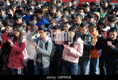 Hefei, China's Anhui Province. 4th Dec, 2014. College students take oath during an activity marking China's first national Constitution Day at Anhui University in Hefei, capital of east China's Anhui Province, Dec. 4, 2014. © Liu Junxi/Xinhua/Alamy Live News Stock Photo