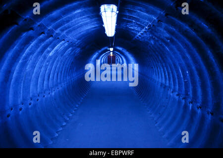 blue illuminated tunnel of Zollverein coking plant, Germany, North Rhine-Westphalia, Ruhr Area, Essen Stock Photo