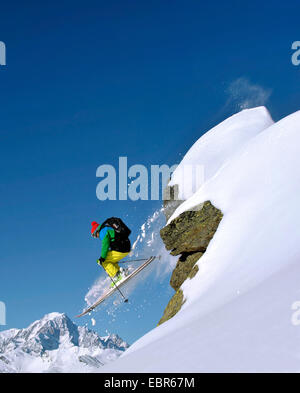 skier in fresh snow at the ski resort Sainte Foy Tarentaise, in the background the Mont Blanc, France, Savoie, Tarentaise Stock Photo