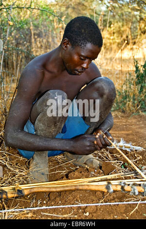 Hadzabe hunter with bow and arrows, Tanzania, Lake Eyasi, Serengeti Stock Photo