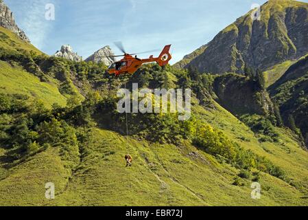 training for a Mountain rescue with a helicopter, Germany, Bavaria, Allgaeu Alps, Oytal Stock Photo
