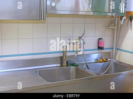 steel industrial kitchen in the school canteen Stock Photo