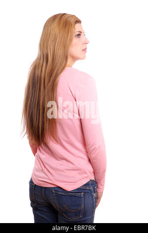 young woman seen from behind with face in profile Stock Photo