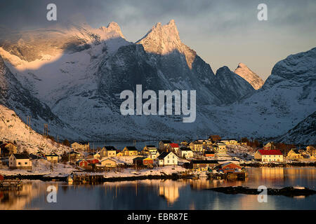 view to snowy coastal town Reine, Norway, Lofoten Islands
