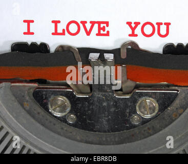 Typewriter Types I LOVE YOU Closeup with red ink Stock Photo