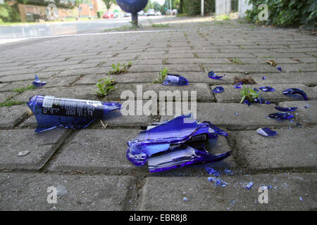 shattered glass bottle on a pavement, Germany Stock Photo