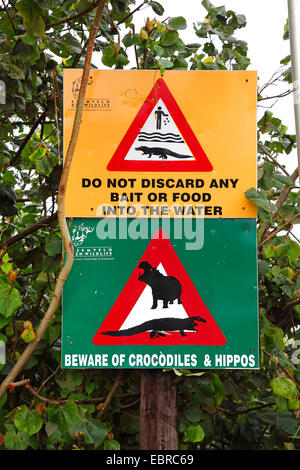 Nile crocodile (Crocodylus niloticus), warning label to crocodiles, South Africa, St. Lucia Wetland Park Stock Photo