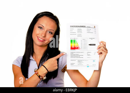 young woman with an energy performance certificate, Germany Stock Photo