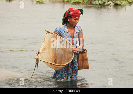 fishing woman in the Rapti River, Nepal, Terai, Chitwan National Park Stock Photo