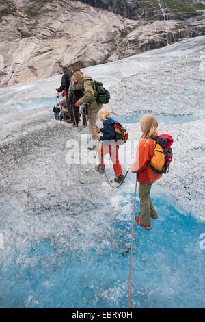 glacier travelling on Nigardsbreen, a glacier arm of Jostedalsbreen glacier, Norway, Jostedalsbreen National Park Stock Photo