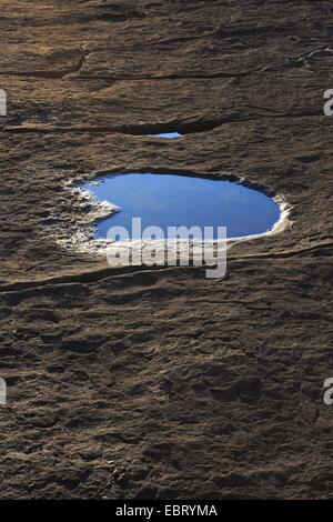 rock with a puddle, Switzerland, Ticino, Verzascatal Stock Photo