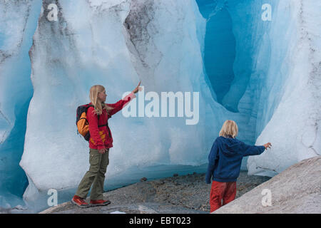 two children at Nigardsbreen glacier, Norway, Jostedalsbreen National Park Stock Photo