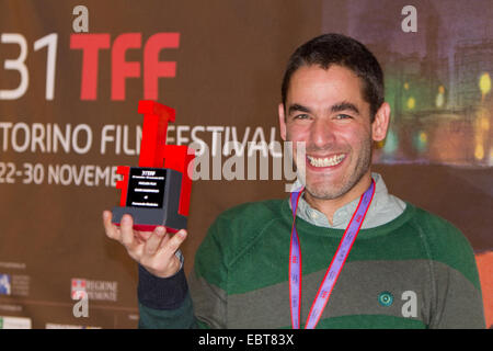 Mexican film director Fernando Eimbcke receives the Best Film Award for the movie 'Club Sandwich' at Torino Film Festival. Stock Photo