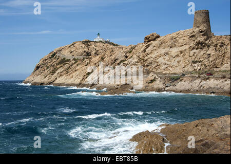 lighthouse on rocky island, France, Corsica, L' Ile-Rousse, Ile de la Pietra Stock Photo