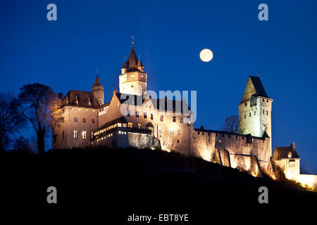 full moon over Altena Castle, Germany, North Rhine-Westphalia, Sauerland, Altena Stock Photo