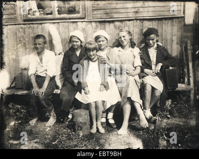 Children on summer vacation in the countryside, circa 1940 Stock Photo