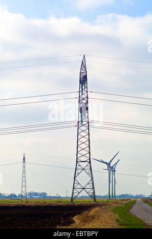 power poles and wind engines, Germany, Lower Saxony, Osterholz Stock Photo