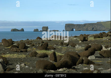 view from a boulder beach at Cape Dyrholaey and the North Atlantic Ocean, Iceland Stock Photo