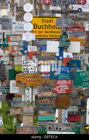 forest of traffic signs at the Alaska Highway installed by travellers, Canada, Yukon, Watson Stock Photo