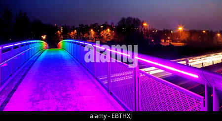 illuminated rainbow bridge in twilight, Germany, North Rhine-Westphalia, Ruhr Area, Dortmund Stock Photo