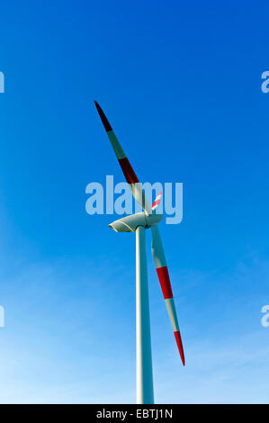 red and white rotor blades against blue sky, Germany Stock Photo