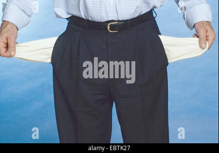 man showing empty trouser pockets Stock Photo