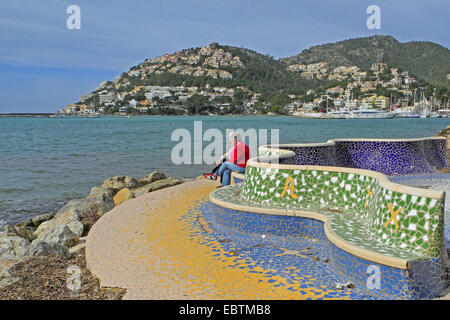 view from a colourfully mosaicked promenade over the bay at the harbour, Spain, Balearen, Majorca, Andratx Stock Photo