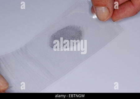 fingerprint fixed with graphite Stock Photo