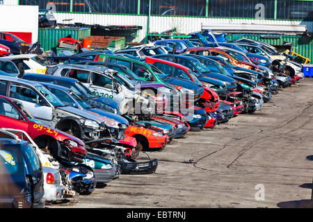 Old cars are piled on a scrapyard, Germany Stock Photo